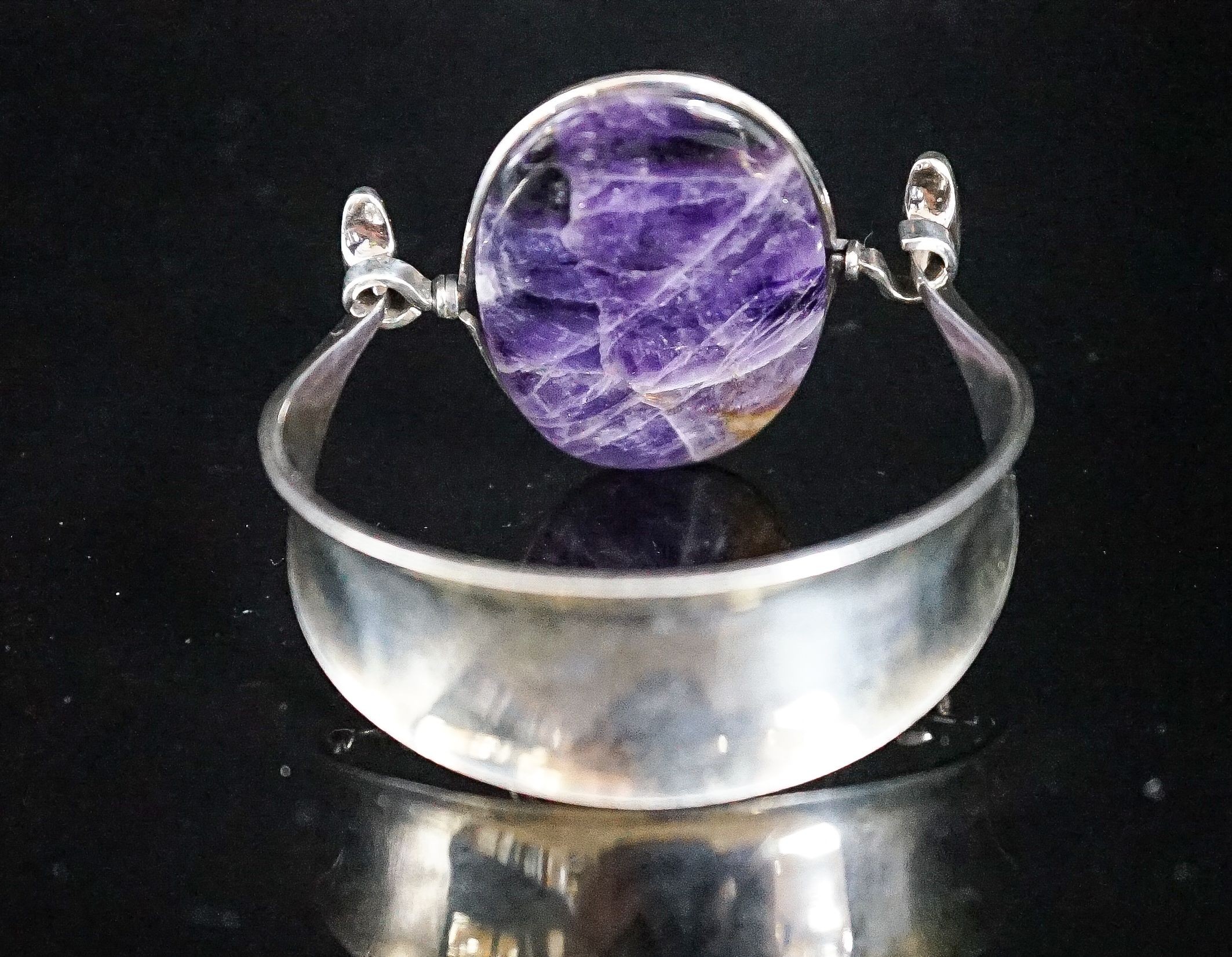 A Vivianna Torun for Georg Jensen sterling and amethyst quartz set openwork bangle, no 203, stone length approx. 43mm.